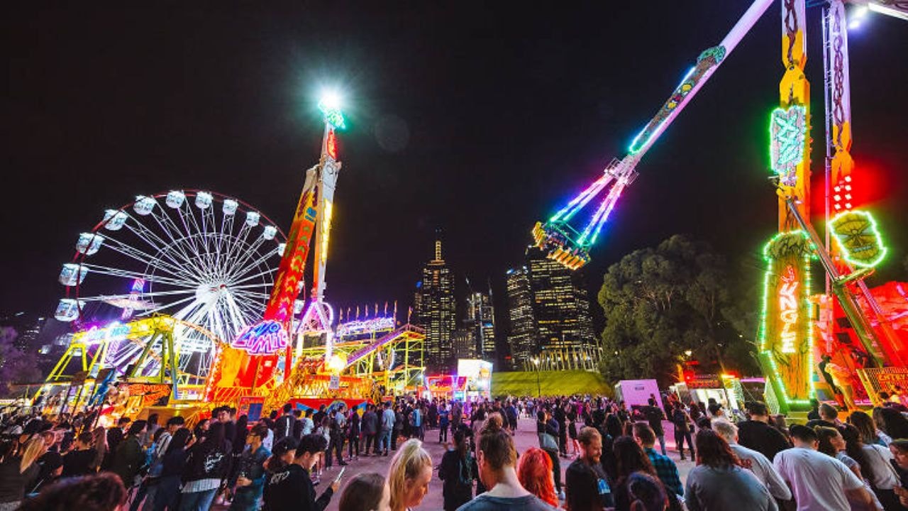 Crowds enjoying rides at the Moomba Festival in Melbourne