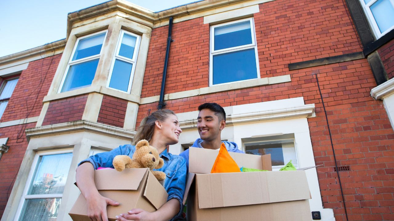 Students transferring items in a PBSA student accommodation