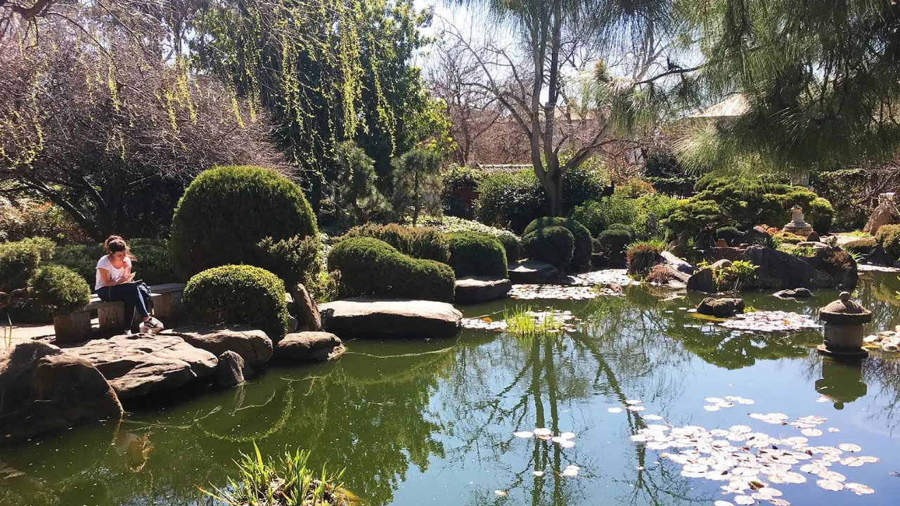 A view of a pond in Himeji Garden offers a serene retreat for nature lovers