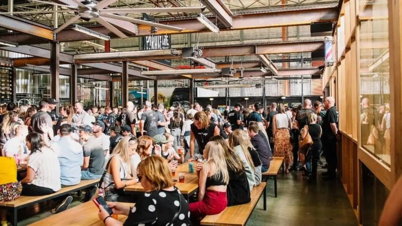 Lively crowd enjoying craft beers at Pirate Life Brewing, highlighting Adelaide's vibrant nightlife