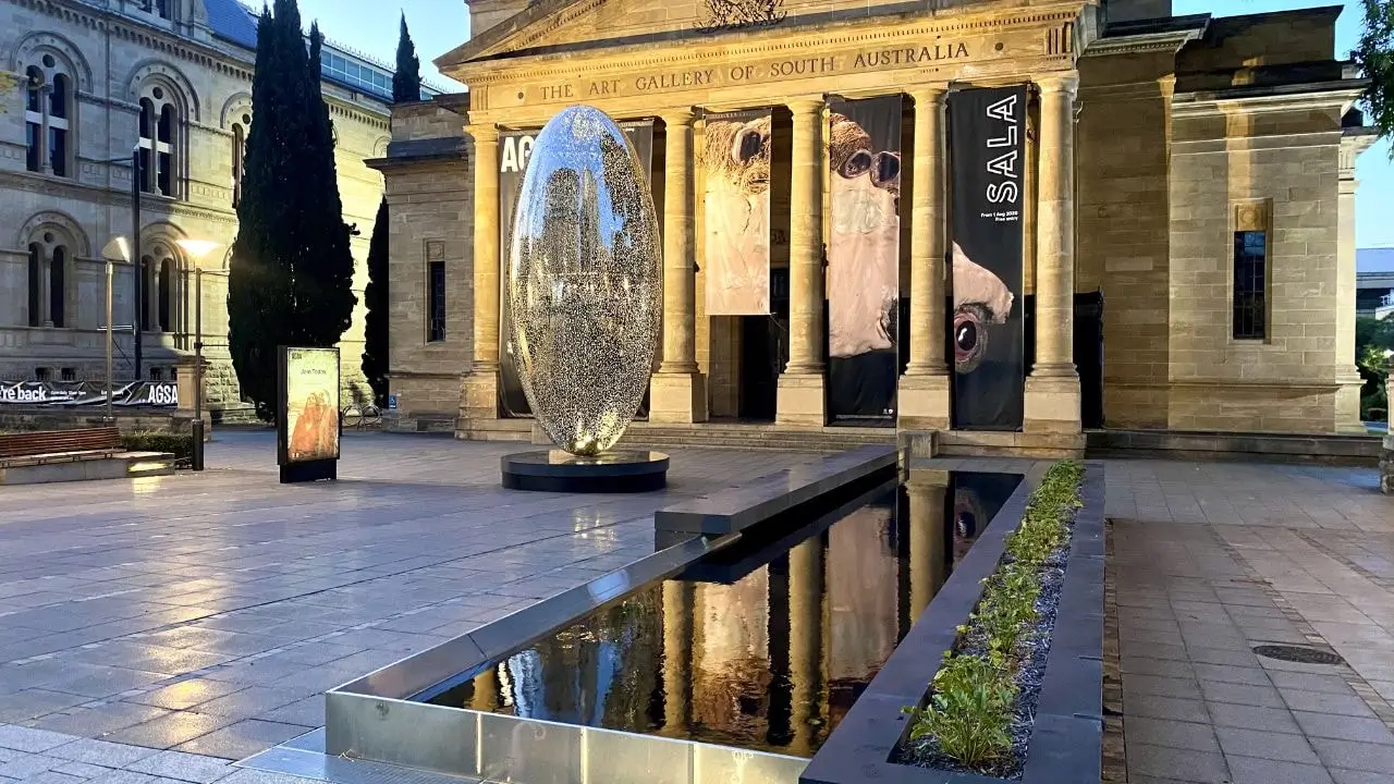 Night view of the Art Gallery of South Australia, highlighting its architectural beauty and cultural significance