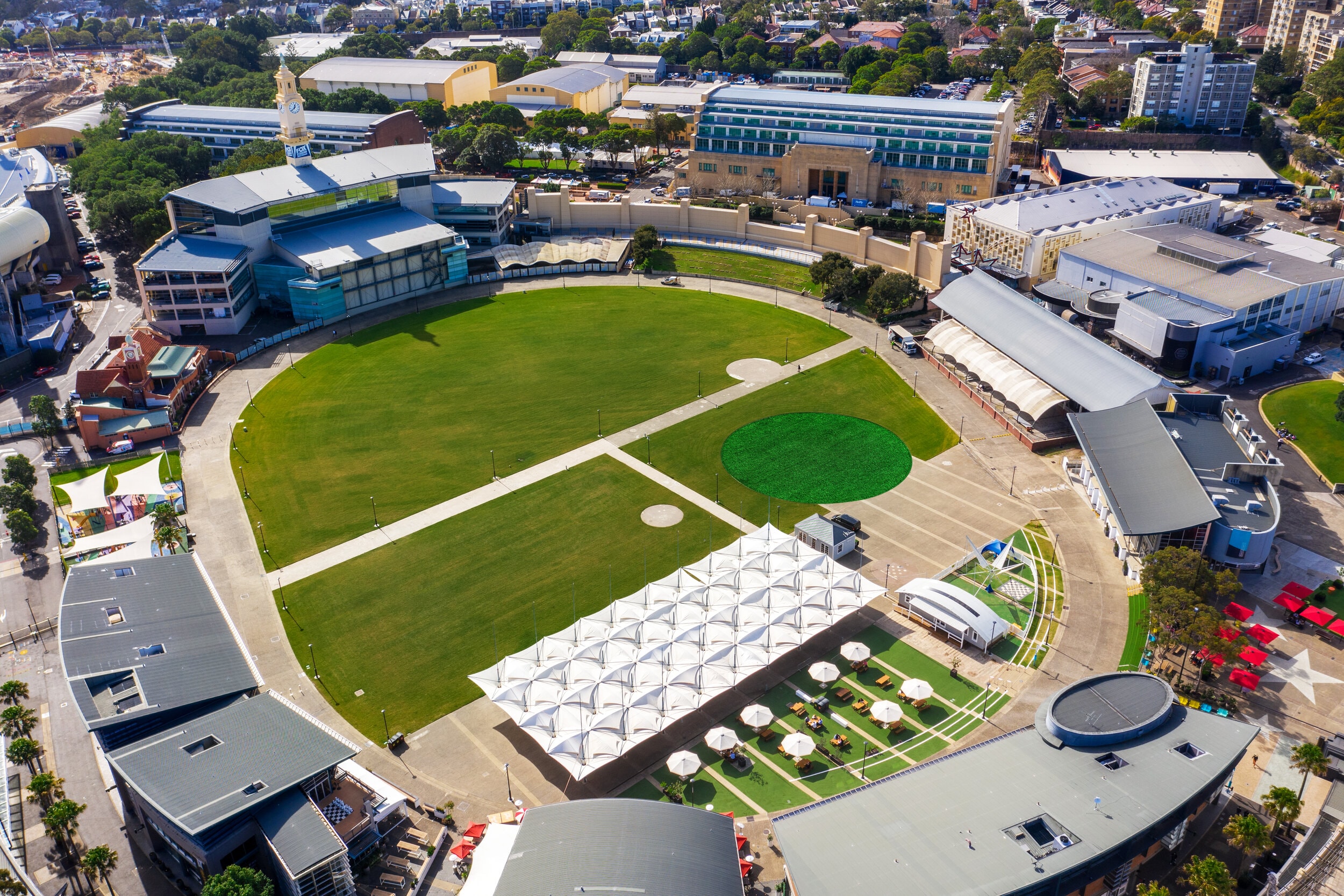 A field surrounded by buildings