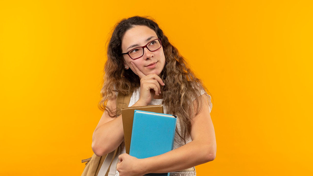 Woman carrying books