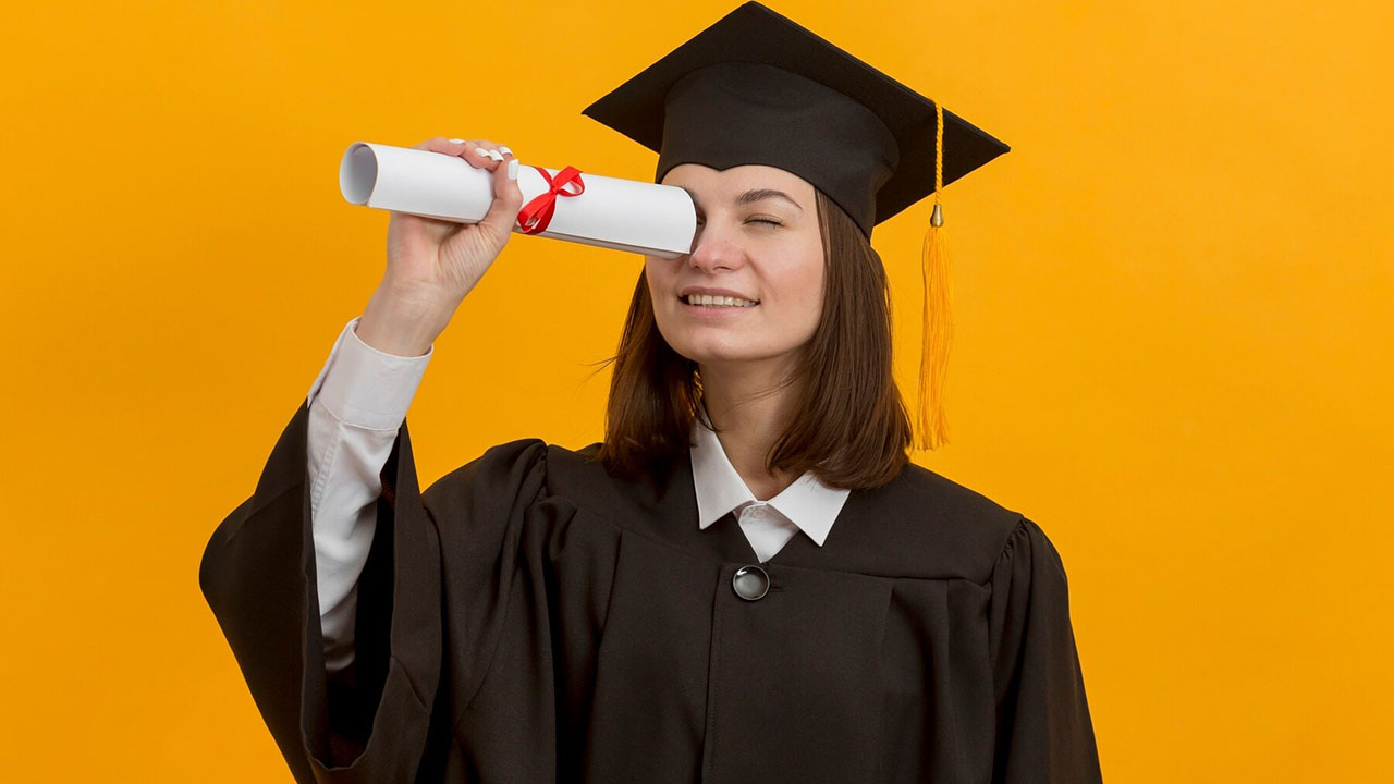 Woman using her diploma as a telescope