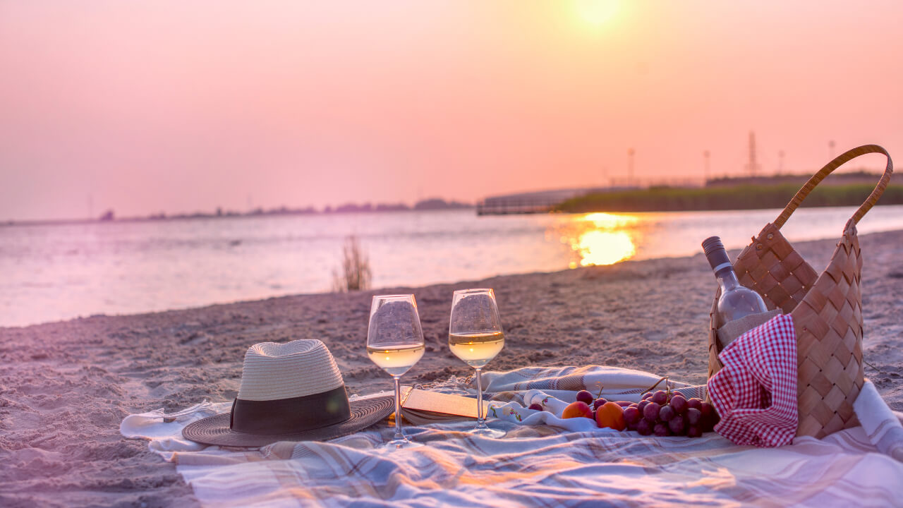 picnic with wine on the beach