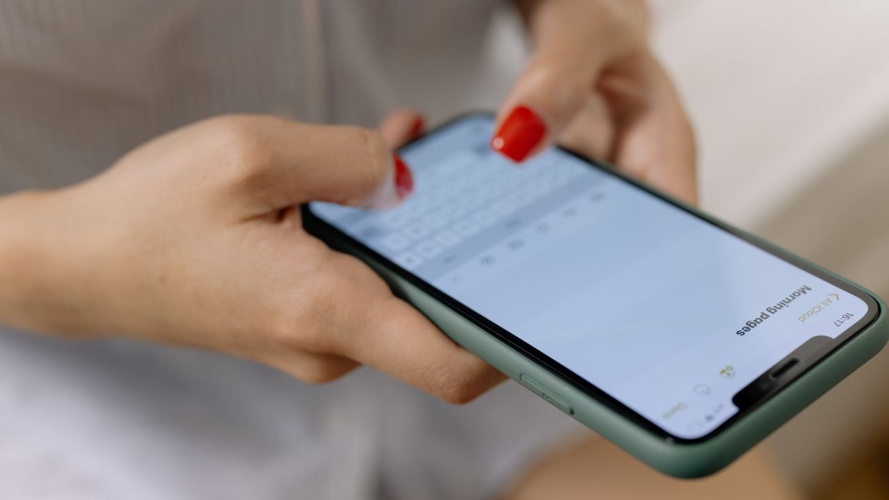 Student typing to create a message