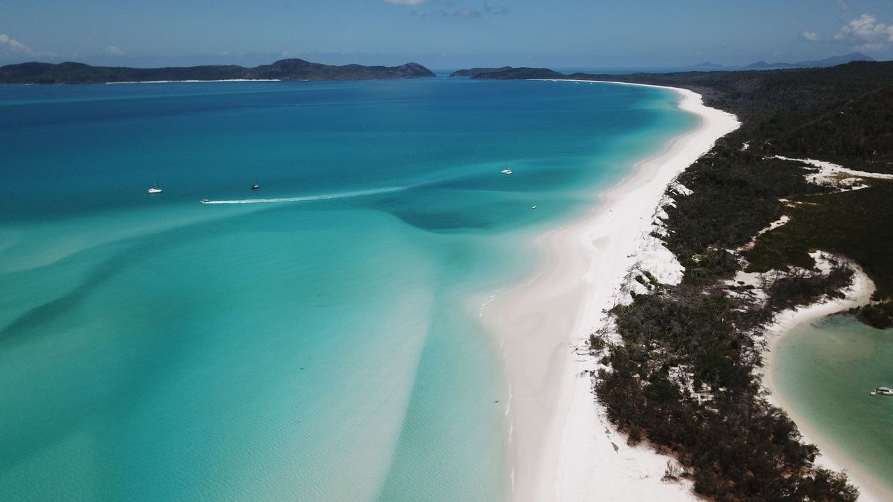 White silica sand and turqouise waters of Whitehaven Beach 